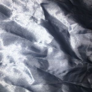 Baby blue sateen silk sheets.