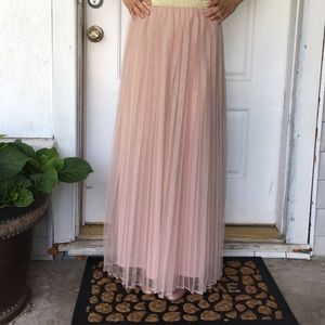 A pale pink tulle skirt