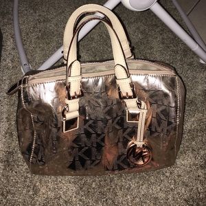 Michael kors rose gold metallic satchel medium