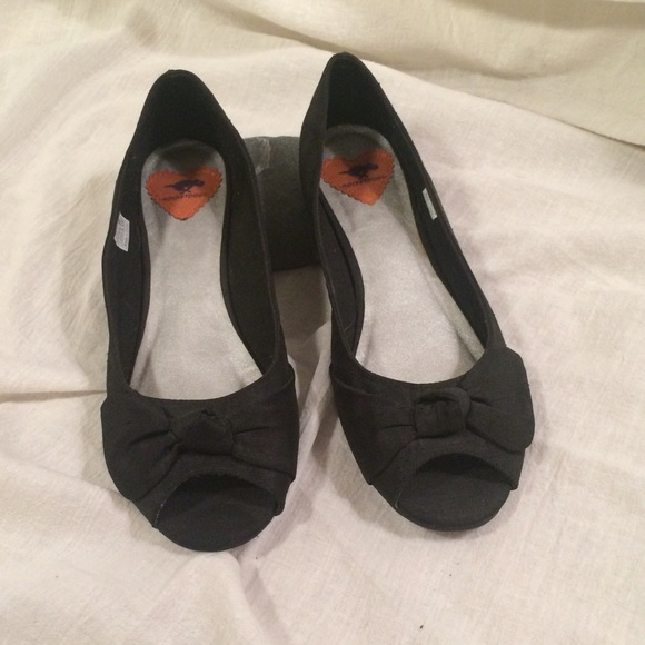 Black ballet flats with bow.