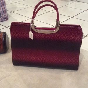 Purse and clutch set. Never used with tags on.