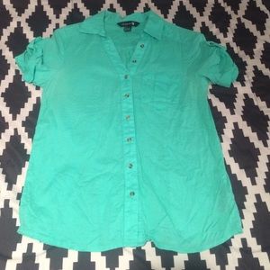 Teal short-sleeved collared shirt.