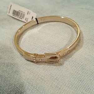 Gold tone bangle Gold tone bangle