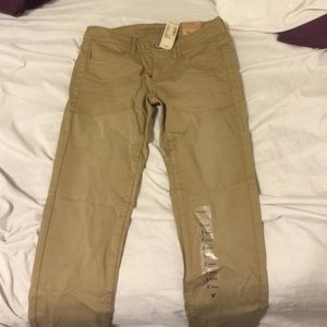 AE khaki jeggings super stretch size 2