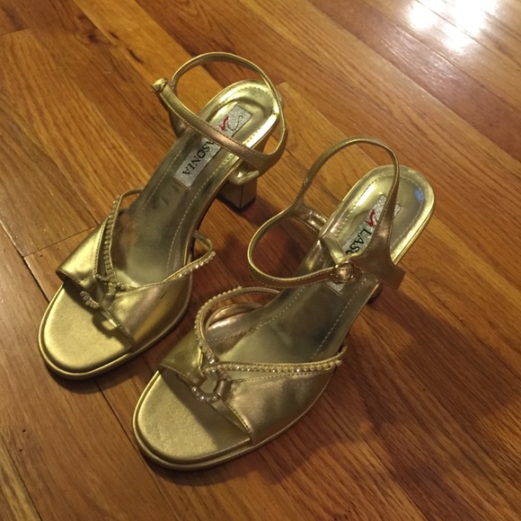 Gold heeled shoes never worn