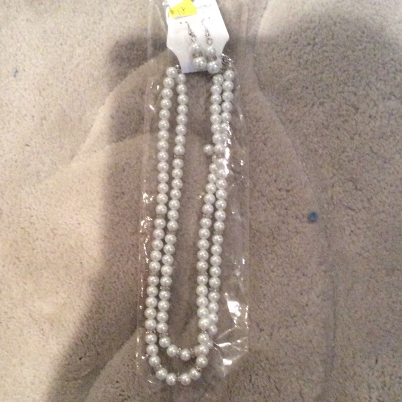 Matching pearl necklace and earrings