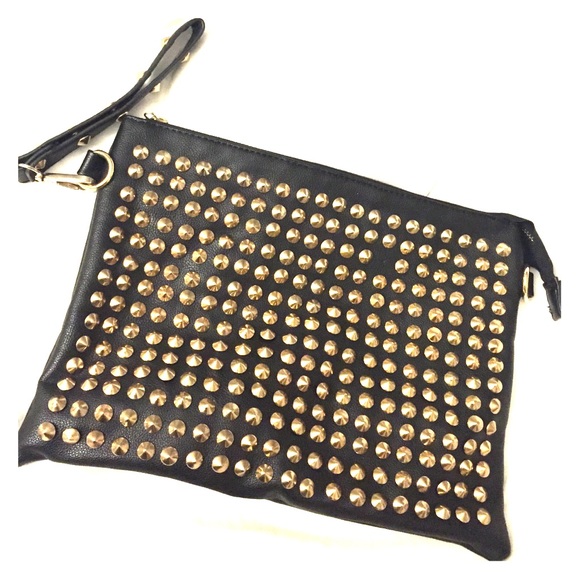 Gold spiked clutch