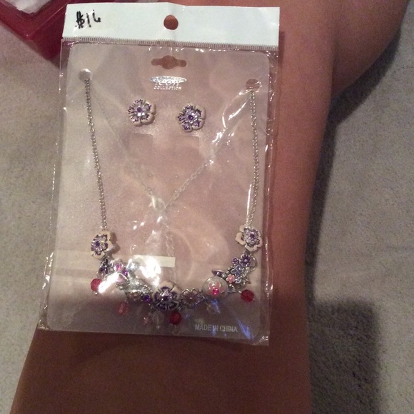 Matching flower necklace and earrings.