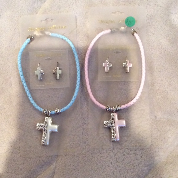 Pink or blue cross necklace and earrings.