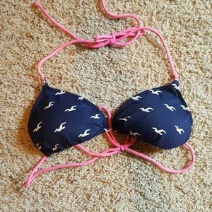 Hollister swimming top size Med.
