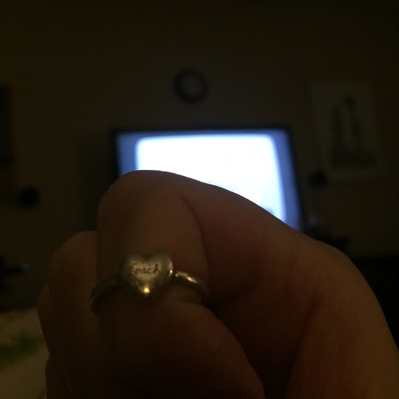 Coach sterling silver heart ring. Says Coach on it