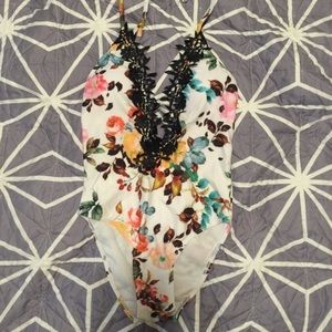 One Piece flora bathing suit with lace detaining