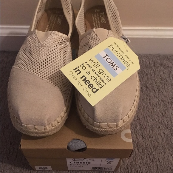 Brand new TOMS size 8 natural mesh canvas slip on