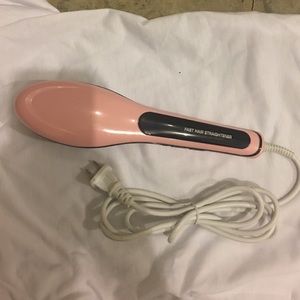 Hair straightener with digital temperature.