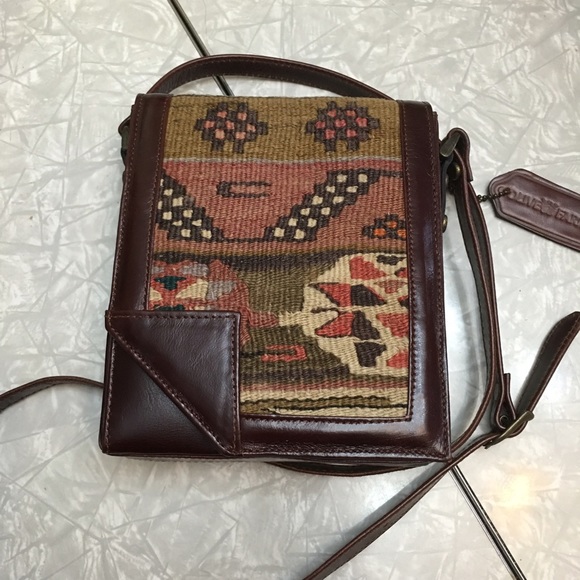 Cross body leather bag with handwoven wool dec