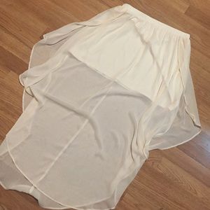 a sheer cream colored maxi skirt