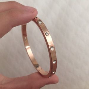 Rose gold diamond incrusted Kate Spade bracelet
