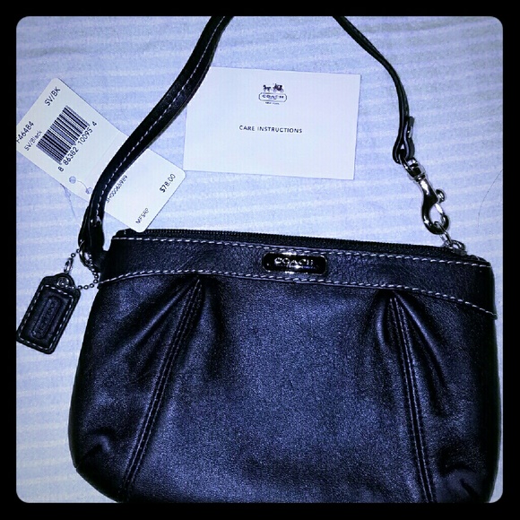 SOLD ! !Brand new coach wristlet