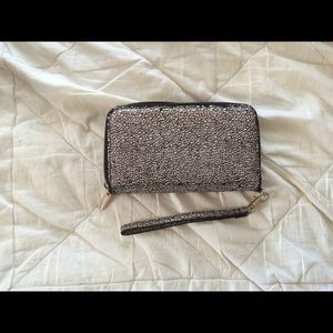 Black and white speckled clutch