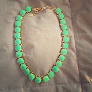 Also statement necklace