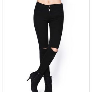 Distressed Black Skinny Jeans