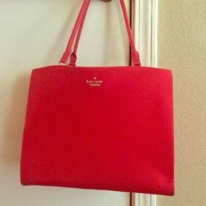 Cherry red Kate Spade purse.