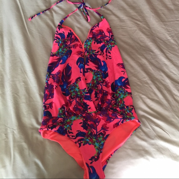 One piece plunge neck bathing suit.
