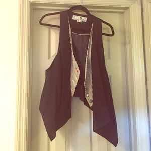 Black vest with stripe inlet