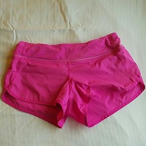 Pink lululemon running shorts