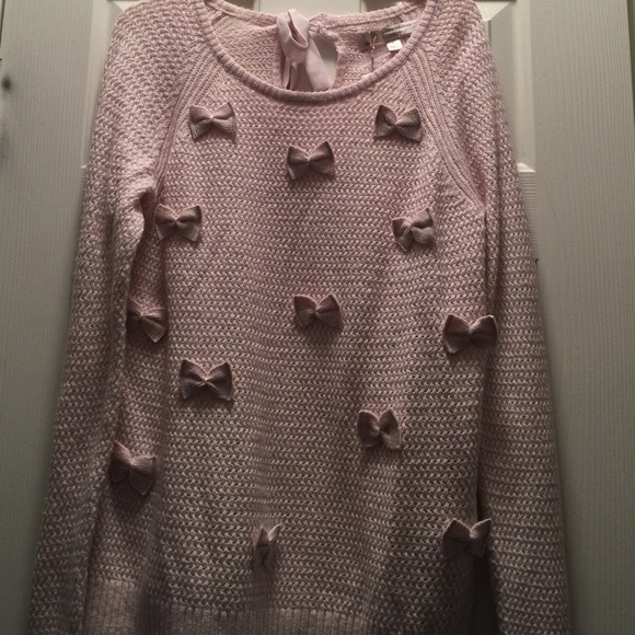 Bow front knitted sweater with back tie