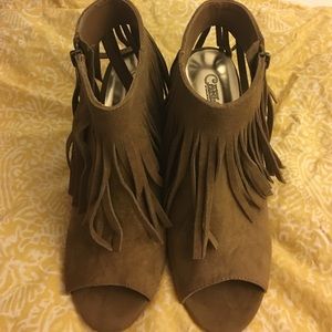 Carlos Santana fringe booties