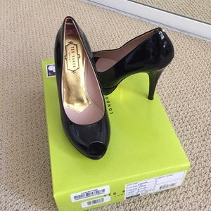 Black patent peep toe pumps
