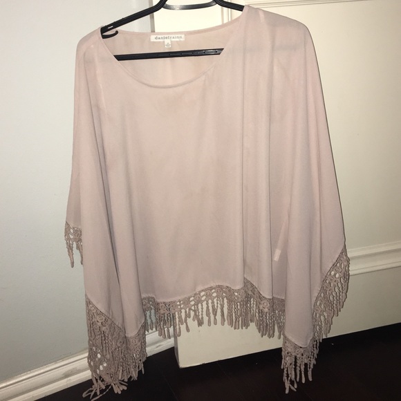 Poncho like top with fringe