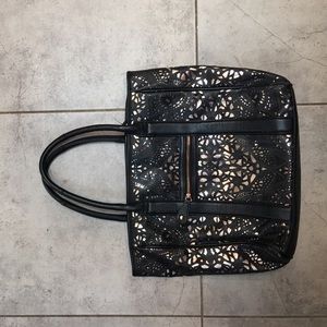 Large black bag with gold accents