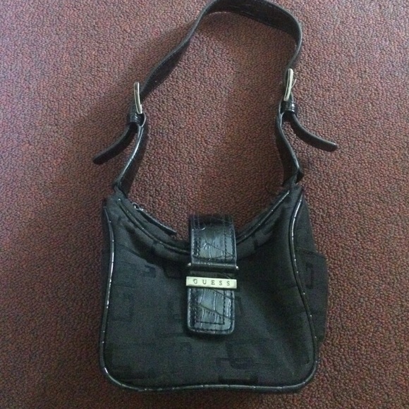 Black purse by Guess