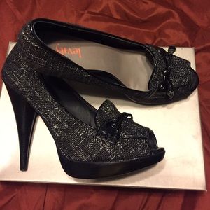 Levity peep-toe pumps