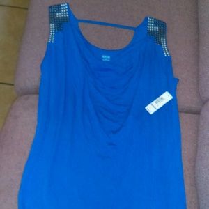 Blue shirt with studs on shoulders