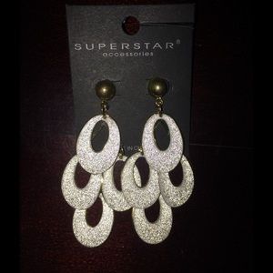 Sparkly, big earrings