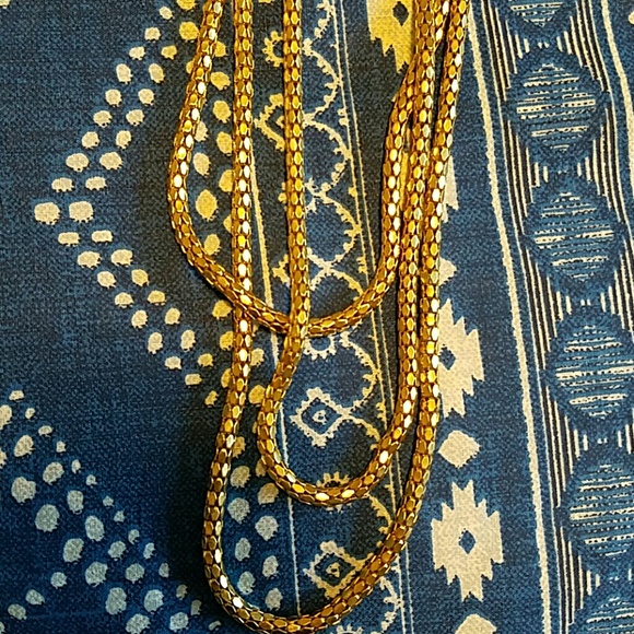 Three strand long gold necklace