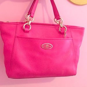 Pretty in pink Coach handbag.