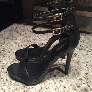 Strap heels. Size 7. Worn once. Great condition