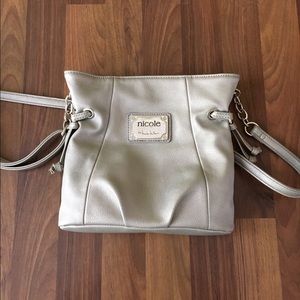 Silver Nicole purse.