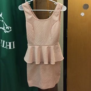 Cute peach peplum dress from Necessary Clothing.