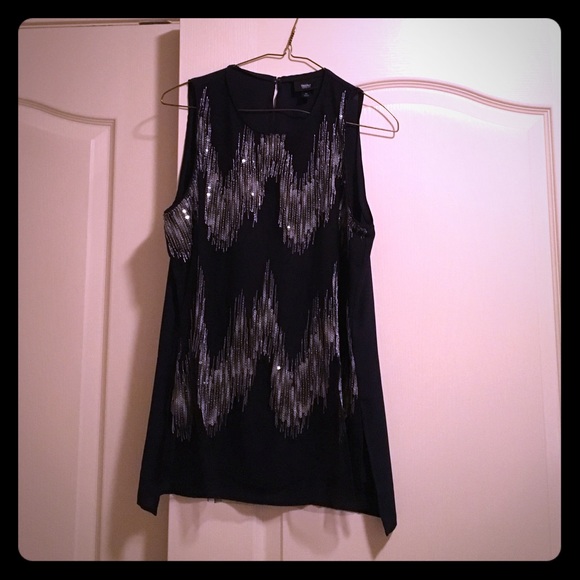 Modern blue tank with tulle covering and sequins