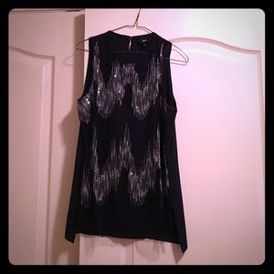 Modern blue tank with tulle covering and sequins