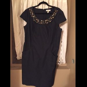 Navy blue dress with gold design.