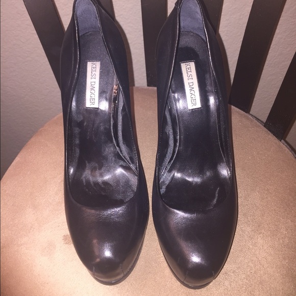 Black leather high heels