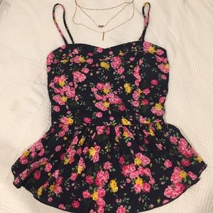 Super cute floral peplum tank top!