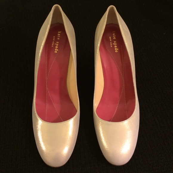 Kate Spade cream/gold colored wedge heel