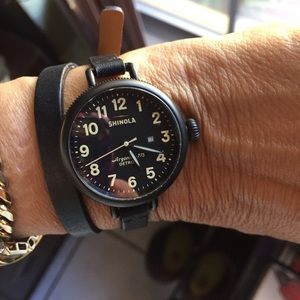 Shinola date watch with leather wrap-around band
